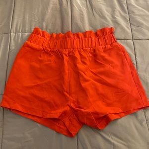 Red shorts with paper bag waist - never worn but no tags